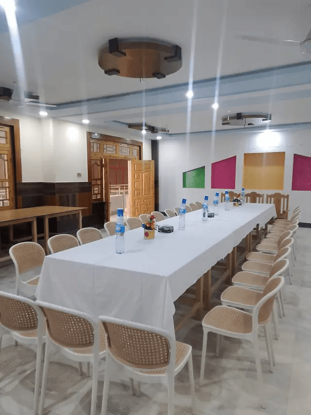 Dining hall with banquet table setup at American Market Booni